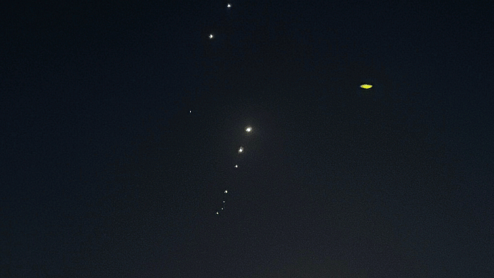 Traces are seen in the sky after Iran's armed forces say they targeted the Al-Udeid base in a missile attack, as seen from Doha, Qatar, on 23 June 2025. | Stringer | Reuters