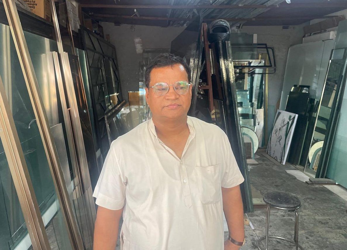 Sushant, owner of Krishna Glass, is one of the many traders who have set up shop in an industrial-only zone