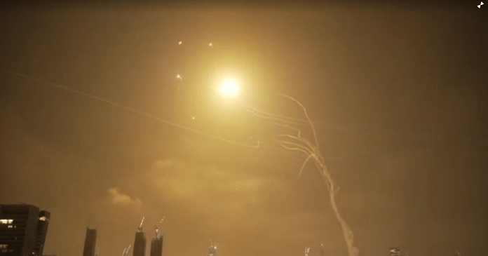 Israeli air defence systems intercepting Iranian ballistic missiles on 13 June, 2025 | Reuters