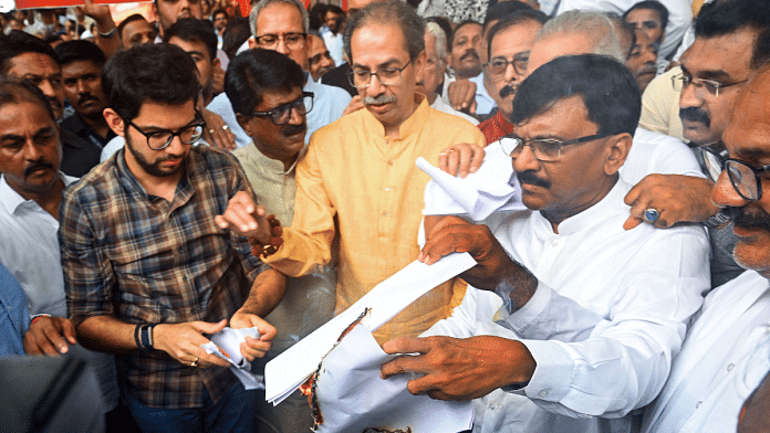 Shiv Sena (UBT) Chief Uddhav Thackeray, party leaders Aditya Thackeray, Sanjay Raut along with supporters stage a protest against Maharashtra government mandating Hindi as the default third language in schools, in Mumbai on 29 June 2025. | ANI