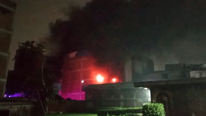 Smoke billows after a fire broke out at a factory, near Rithala metro station, in New Delhi, Tuesday night, June 24, 2025. Photo |PTI
