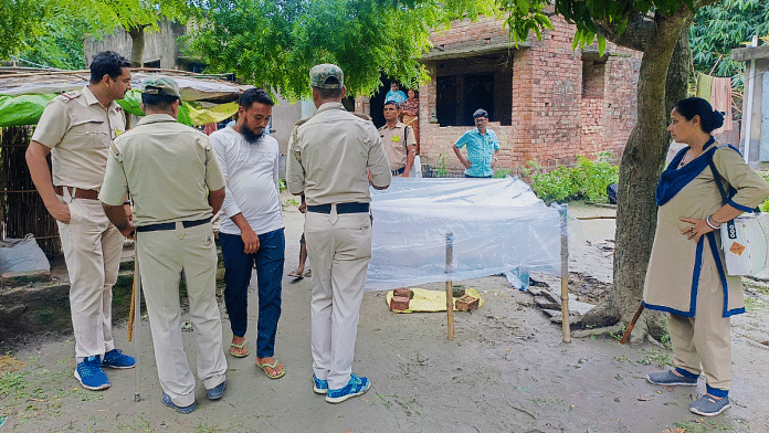 Police personnel conduct investigation at the site after a girl was killed in a bomb explosion in Kaliganj on 23 June 2025. | PTI