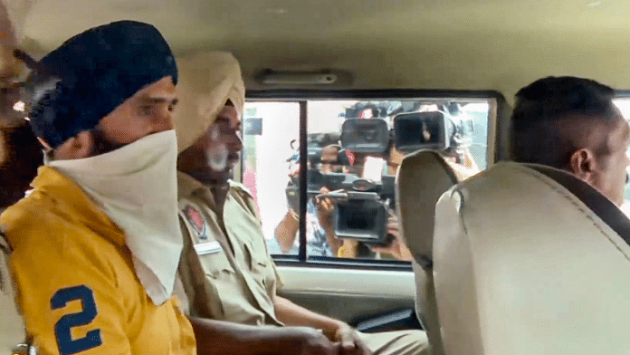 Punjab-based YouTuber Jasbir Singh, who was arrested on espionage charges, being produced at a district court after his three-day police remand ended, in Mohali, Punjab, Saturday, June 7, 2025. A Mohali court on Saturday extended for two days the police remand of the YouTuber | PTI