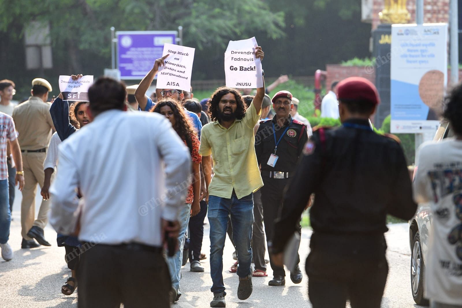 JNU students staging protest ahead of inauguration of Shri Chhatrapati Shivaji Maharaj Special Centre for Security and Strategic Studies and the Kusumagraj Special Centre for Marathi Language, Literature and Culture at JNU convention centre; the inauguration was attended by Maharashtra CM Devendra Fadnavis | Suraj Singh Bisht