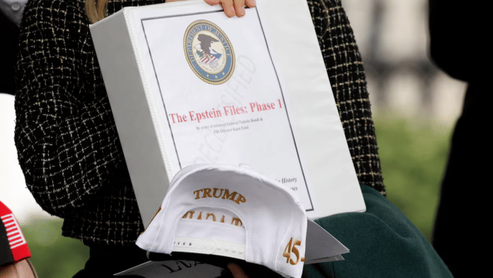 People walk out of the West Wing of the White House with 