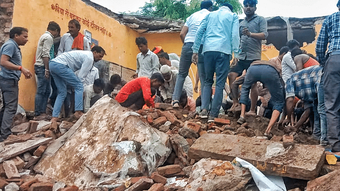 Locals during the rescue work after a government school building collapsed, in Jhalawar district, Rajasthan, Friday, 25 July, 2025 | PTI