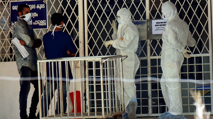 File photo of hospital staff outside an isolation ward of Kerala's Ernakulam Medical College in a previous outbreak of Nipah cases | ANI