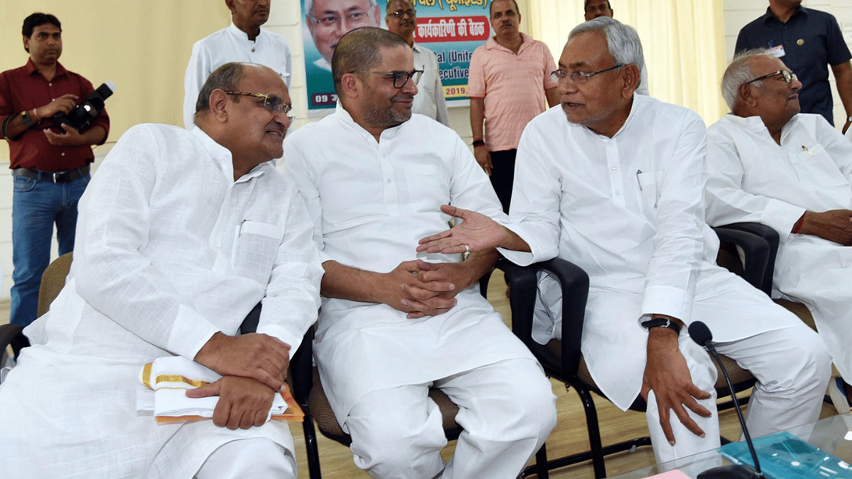 Bihar CM Nitish Kumar with JD-U's KC Tyagi (L) & Prashant Kishor (C) in 2019 when Kishor was the party's vice president | ANI file photo 