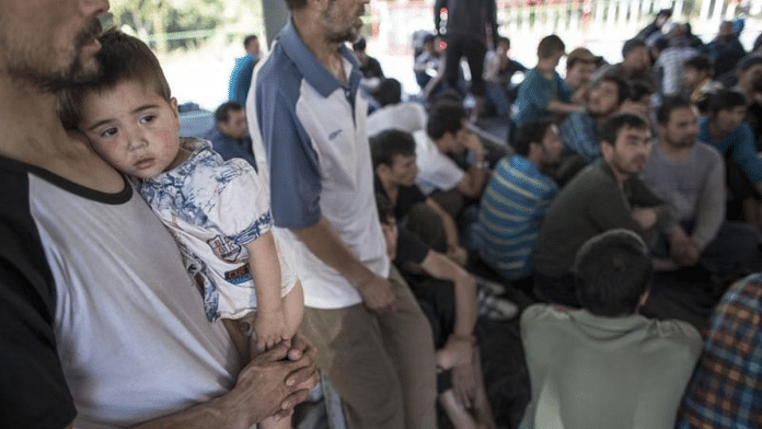 File photo of about 200 people being rescued by police from a human smuggling camp in southern Thailand, March 2014 | Reuters