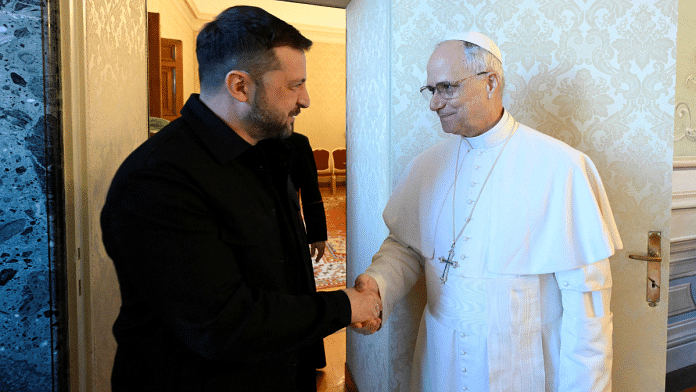 Pope Leo XIV and Ukrainian President Volodymyr Zelenskiy shake hands as they meet in Castel Gandolfo, Italy, July 9, 2025. Vatican Media/Francesco Sforza/­Handout via REUTERS