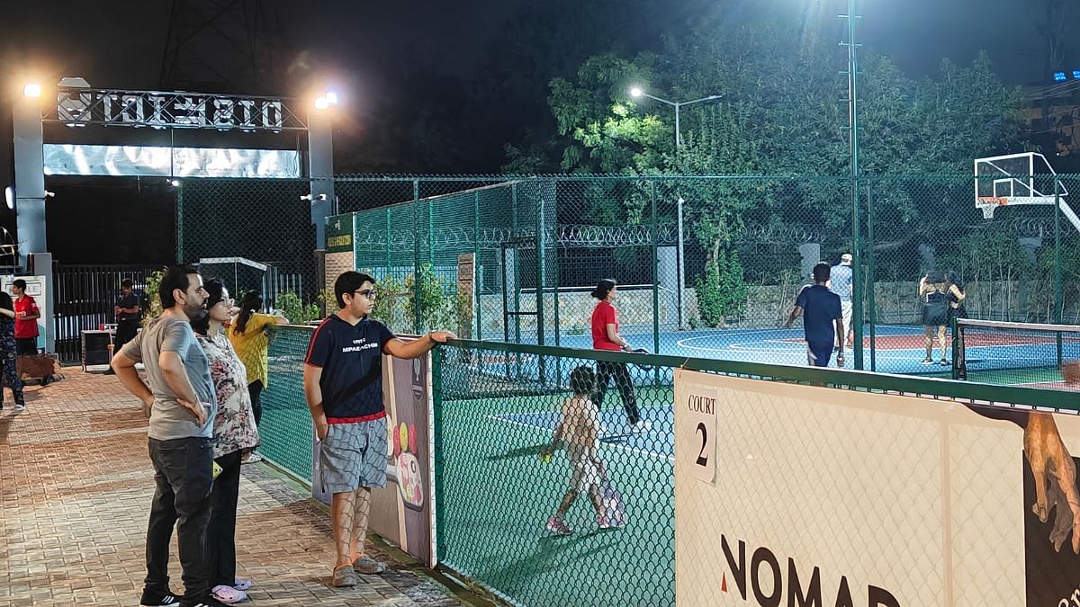 A late night pickleball match in session. District 9 has four state-of-the-art pickleball courts | Photo: Tina Das, ThePrint