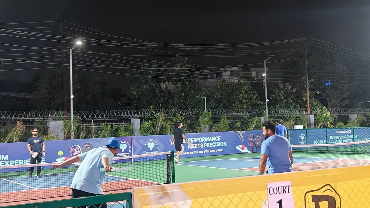 A late night pickleball match in session at District 9. Extending the 30 minute time slots is nearly impossible—the place is almost always booked full | Photo: Tina Das, ThePrint