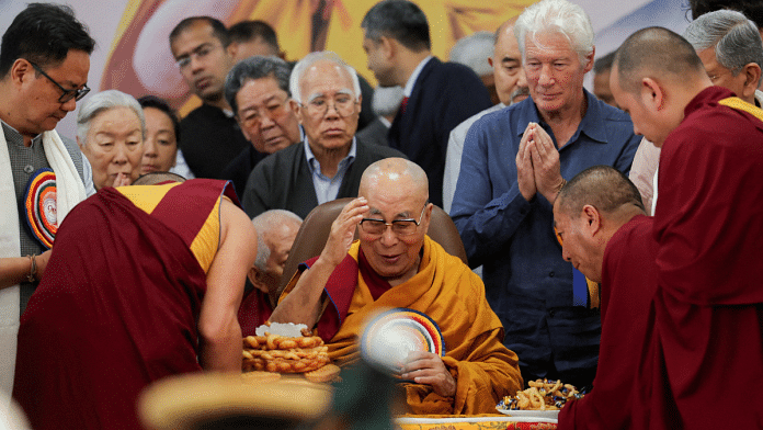 Tibetan spiritual leader, the 14th Dalai Lama, is served food on his 90th birthday celebration at the Tsuglagkhang, also known as the Dalai Lama Temple complex, in the northern town of Dharamshala, India, July 6, 2025 | Reuters