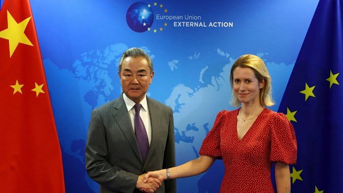 EU High Representative for Foreign Affairs and Security Policy and Vice-President of the European Commission Kaja Kallas shakes hands with Chinese Foreign Minister Wang Yi in Brussels, Belgium on 2 July 2025 | Yves Herman | Reuters