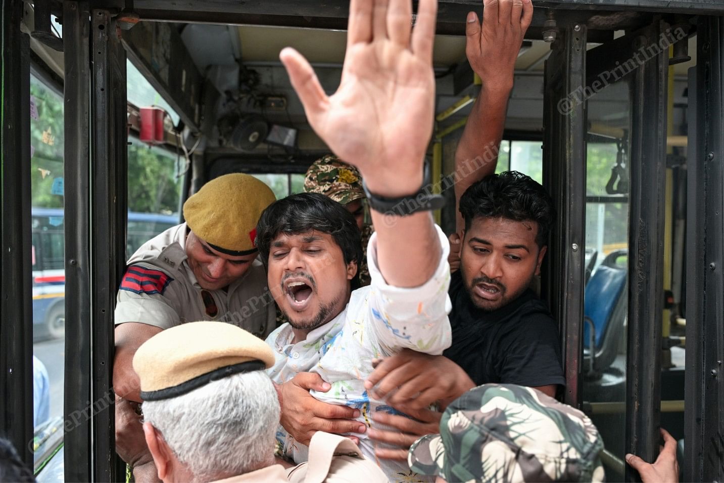 A Youth Congress member being detained by the police amid the protest against SIR. Photo by Suraj Singh Bisht