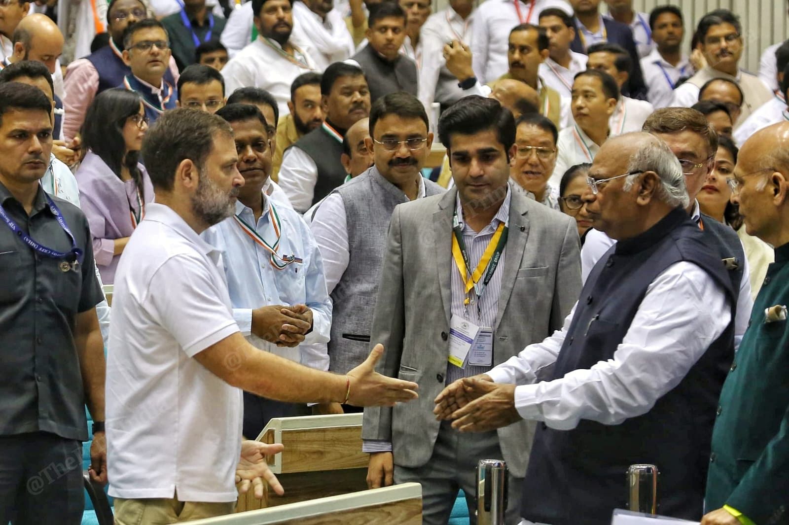 Rahul Gandhi shakes hand with Congress President Mallikarjun Kharge at a Congress conclave on constitutional challenges in Delhi’s Vigyan Bhawan | Praveen Jain | ThePrint