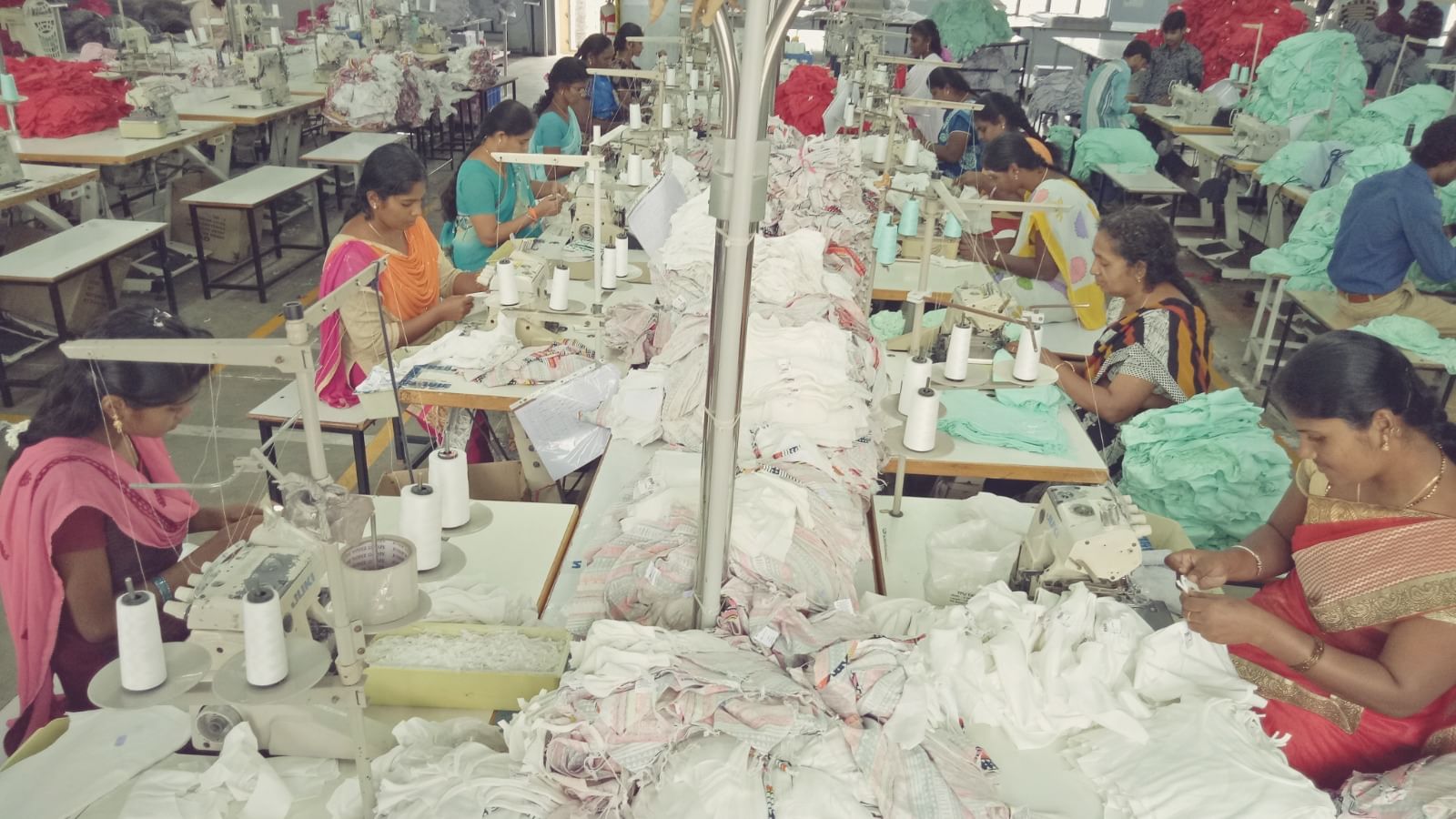 Garment workers face an uncertain future, with ongoing talks of reducing their shifts. Many relied on overtime to pay their children’s school fees