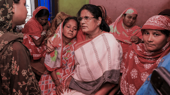 Odisha Deputy Chief Minister Pravati Parida meets family members of a 15-year-old girl who succumbed to her burn injuries after she was allegedly set on fire by 3 miscreants, at Bayabar village in Puri district. | PTI