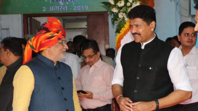 File photo: Mohan Delkar (R) at an event in 2019 with Praful Khoda Patel (L), the administrator of UT of Dadra and Nagar Haveli, and Daman and Diu, who was accused of abetting the former's death | X: @MohanDelkar