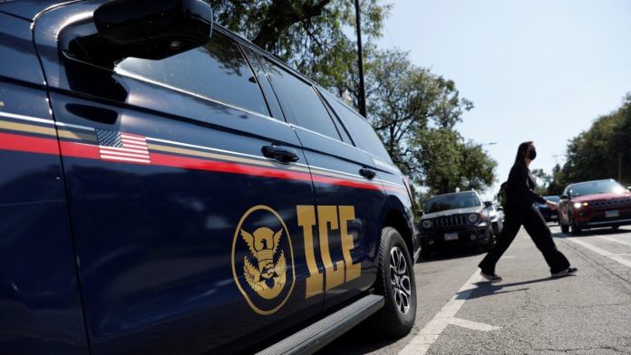 An Immigration and Customs Enforcement (ICE) vehicle parked outside Cook County Courthouse in Chicago | REUTERS/Octavio Jones