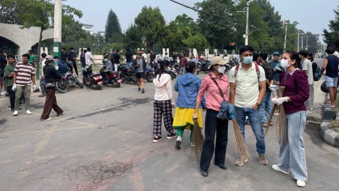 Broom in hand, Kathmandu residents clean up streets as dust settles on anti-corruption protest | Udit Hinduja | ThePrint
