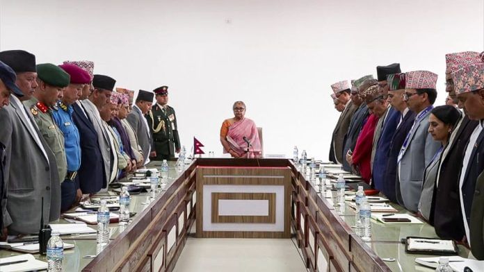 Interim PM of Nepal Sushila Karki addresses a meeting with officials as she takes charge, in Kathmandu on Sunday | ANI