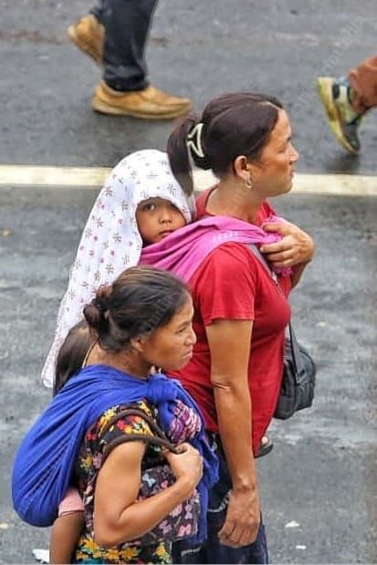 Mother carrying his son on back going to peace ground to witness Prime Minister Narendra Modi speech | Praveen Jain | ThePrint
