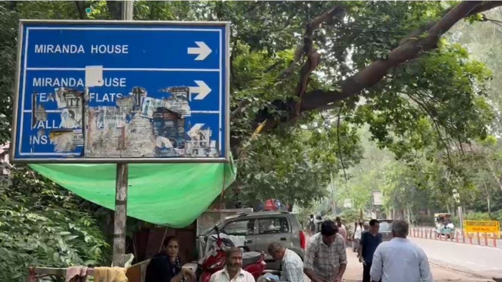 A defaced signboard in Delhi University’s North Campus