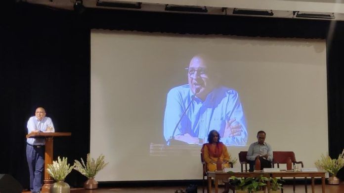 Professor Pratap Bhanu Mehta delivers a lecture at the 2025 DS Borker Memorial Lecture Series. Journalist Chitrangada Choudhury and senior editor Harish Khare are seated alongside him on stage. | Sakshi Mehra | ThePrint