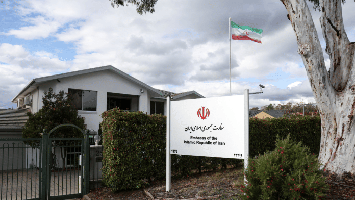 File photo of an Iranian flag flutters outside the Embassy of the Islamic Republic of Iran | Reuters
