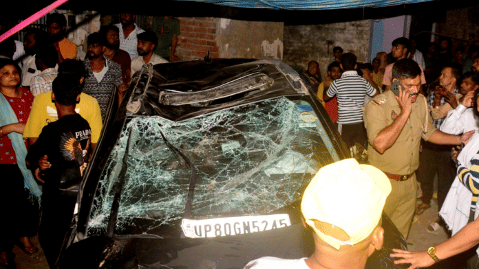 Agra accident Agra: Police personnel and people gather at the site after a speeding car allegedly ran over pedestrians, killing five and injuring two, in Agra, Uttar Pradesh, Saturday, Oct. 25, 2025 | PTI