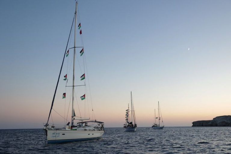 Flotilla says Israeli vessels intimidated its boats as it approaches Gaza
