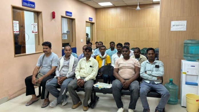 Migrant workers awaiting their interviews Blue collar migrants from India