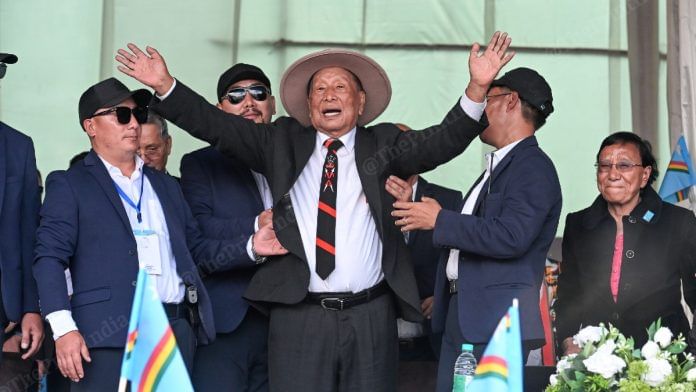 Muivah NSCN (Isak-Muivah) general secretary Thuingaleng Muivah greeting supporters at Senapati on 29 October, 2025 | ThePrint/Suraj Singh Bisht