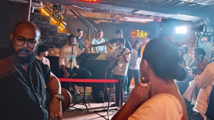 The crowd braved a sudden downpour to attend the event | Photo: Tina Das, ThePrint