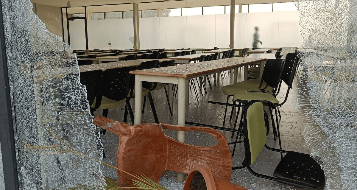 Shards of broken glass at Vellore Institute of Technology Bhopal where violence erupted on the night of 25 November 2025, triggered by a jaundice outbreak | Krishan Murari/ThePrint