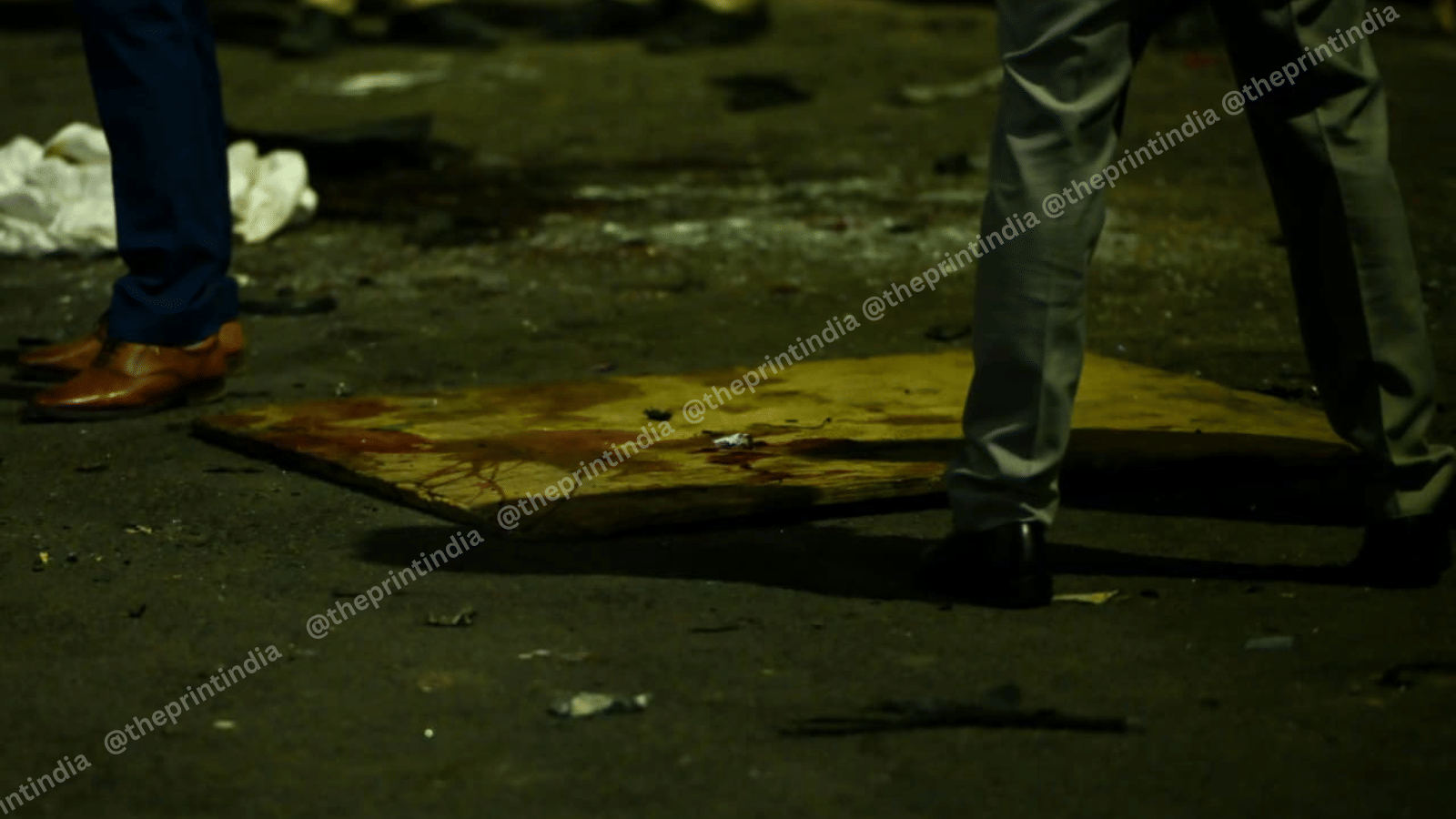 Blood splattered on the door of a car destroyed in the blast that has claimed at least a dozen lives | ThePrint/Suraj Singh Bisht