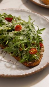 Avocado toast at Rajan and Deepika Sethi’s Omo Cafe in Gurugram. | By special arrangement