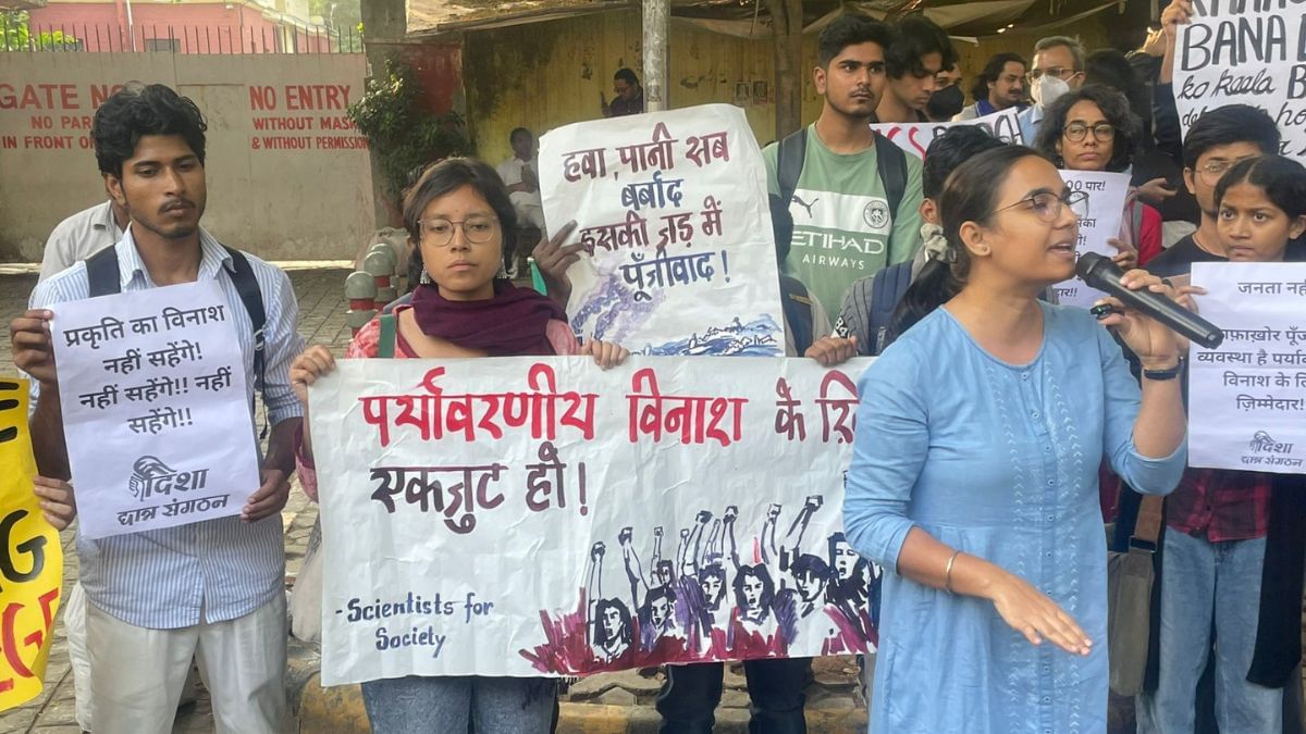 While some protestors rotated amongst themselves to speak in front of the media, others wrote “smash capitalism, save environment” in multi-coloured chalk on the streets. | Udit Hinduja | ThePrint