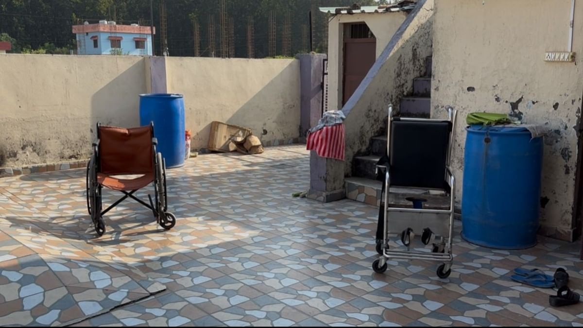 Sandarbh's wheelchair and toilet seat in the courtyard of his house | ThePrint/Khadija Khan