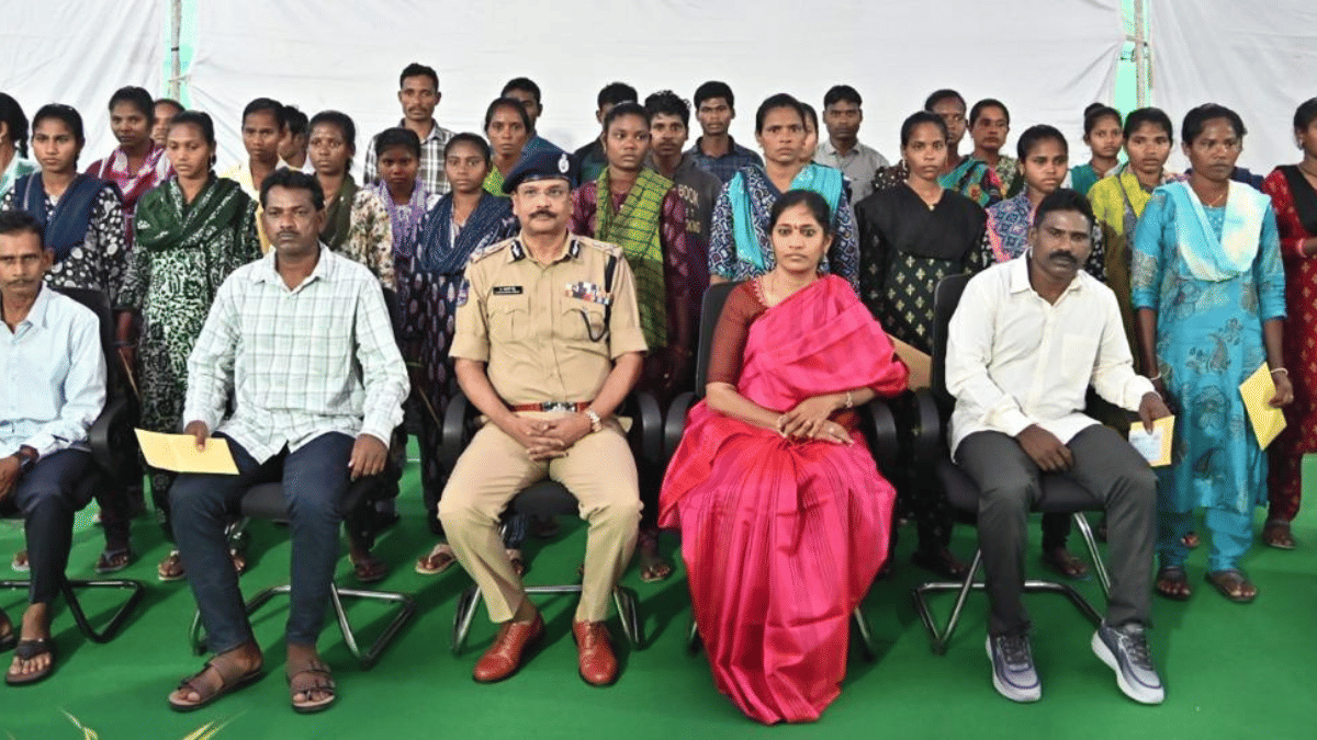 Muchaki Somada alias Erra seated left of DGP Shivdhar Reddy after surrendering with 36 other Maoist cadres in Hyderabad. | By special arrangement