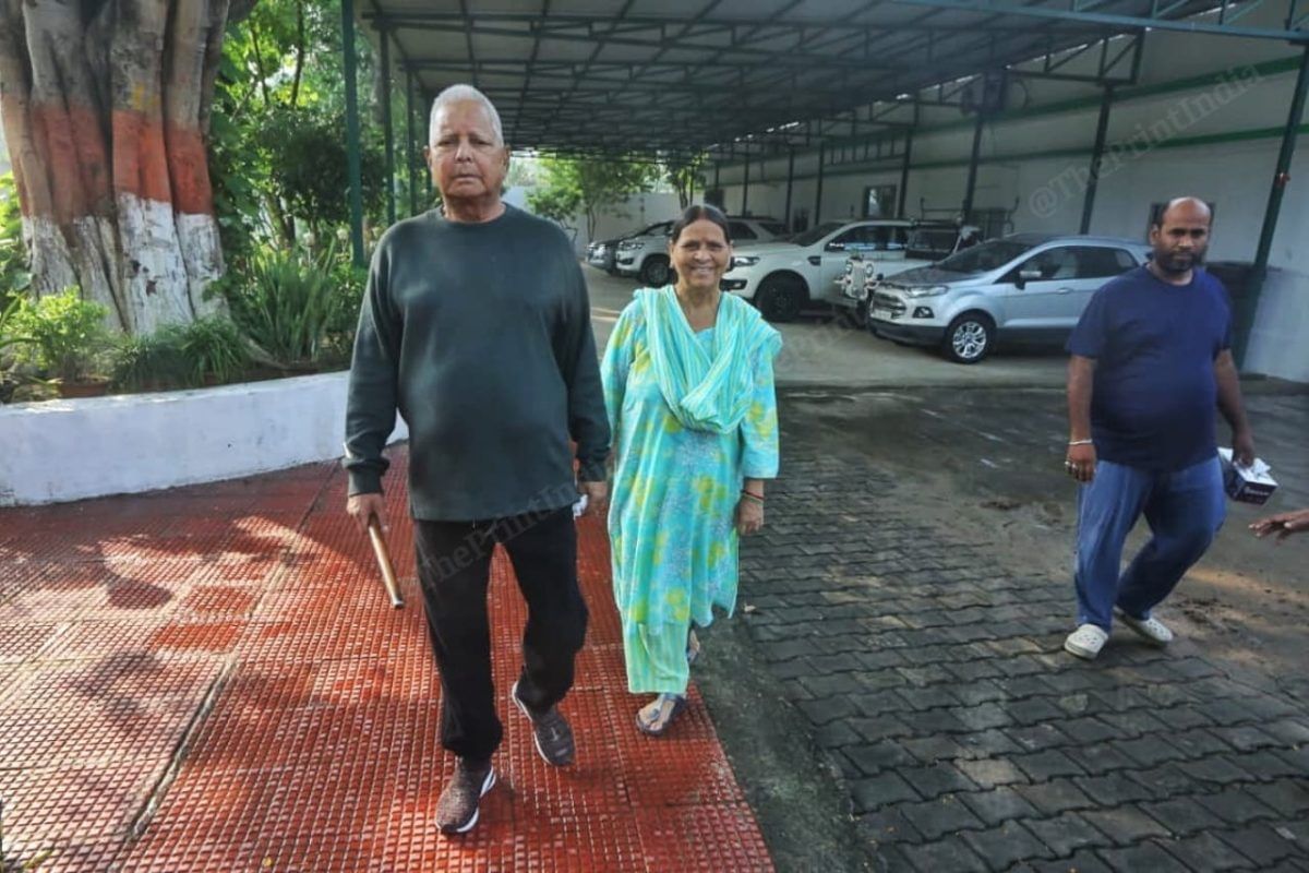 Lalu Yadav and his wife Rabri Devi take a morning walk at their residence | Praveen Jain | ThePrint