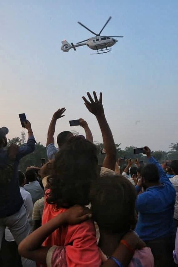 Crowds gather at the helipad during the arrival of CM Nitish Kumar | Praveen Jain | ThePrint