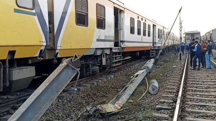Two coaches of 63081 Rampurhat-Jasidih EMU local passenger train derail near Dumka railway station, in Dumka on Thursday. The derailed bogie damaged an OHE electric pole | ANI