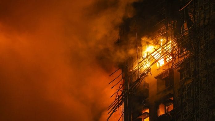 Fire engulfs residential buildings at Wang Fuk Court in Hong Kong on Nov. 26 | Bloomberg