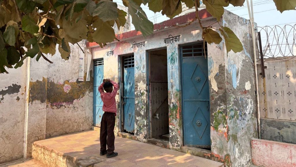 A student waiting outside the toilet in a PM Shri composite school in Greater Noida | Photo: Samridhi Tewari, ThePrint