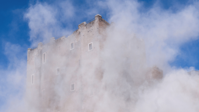 Dust rises as part of the Torre dei Conti tower collapses following an earlier partial collapse, near Via dei Fori Imperiali, near the Colosseum, in Rome, Italy | Reuters