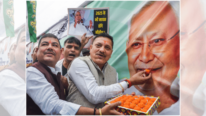 JDU members celebrate as the NDA alliance leads during the counting of votes of the Bihar Assembly elections, in Patna, Friday, Nov. 14, 2025 | PTI