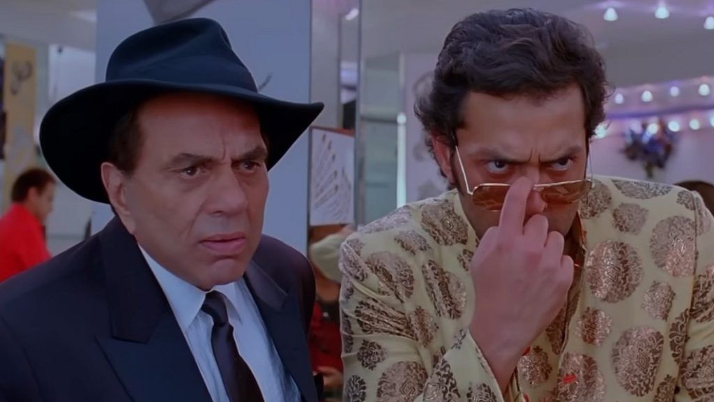 Dharmendra and Bobby Deol as a conman father-son pair in Yamla Pagla Deewana (2011), the first film in the comedy franchise