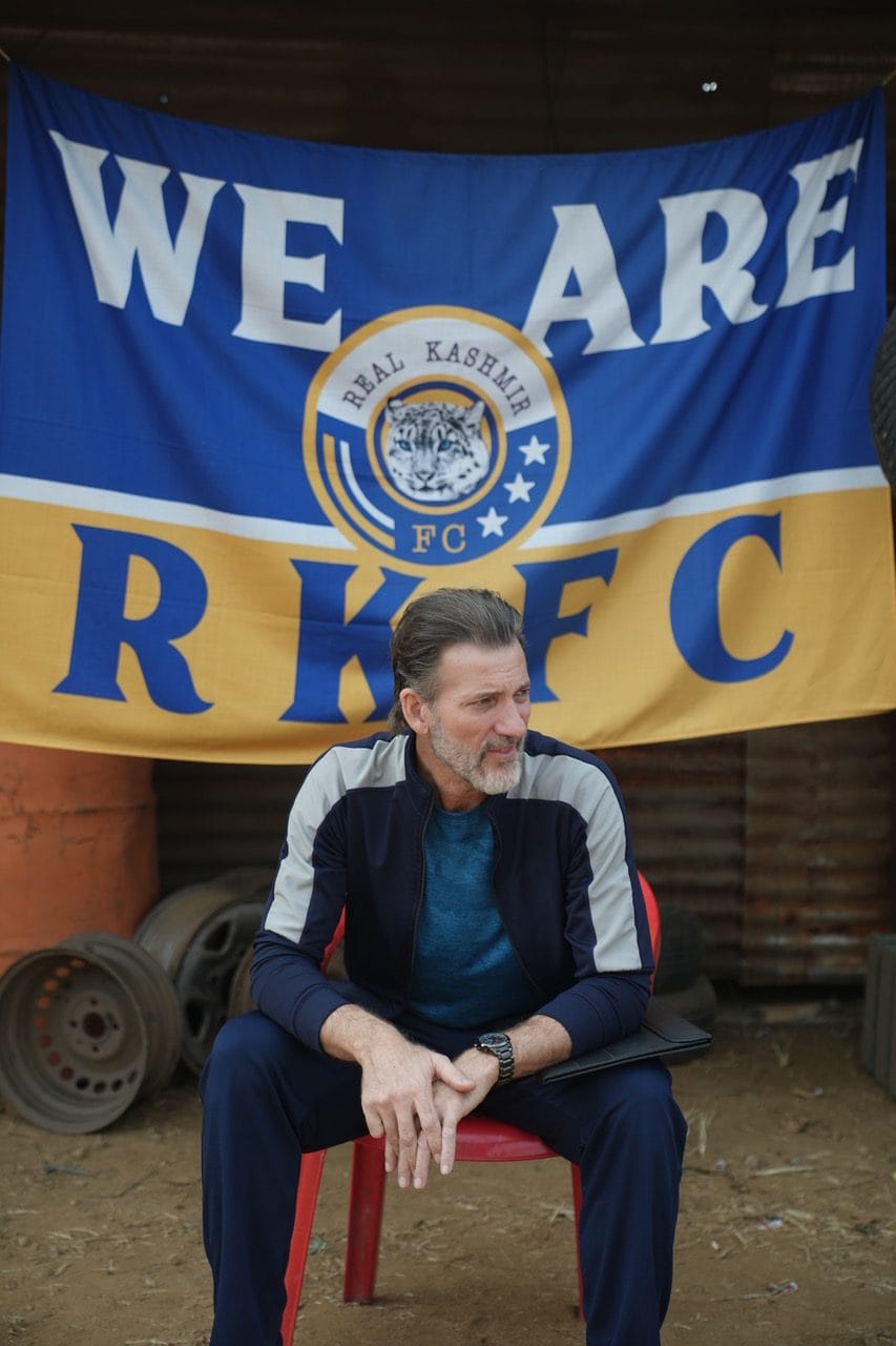 Mark Bennington with RKFC flag | Special arrangement